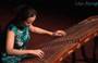 Liu Fang plays guzheng, Chinese zither with 21 strings