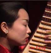Liu Fang plays the pipa, a Chinese lute